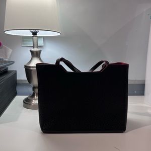 Tumi hand bag